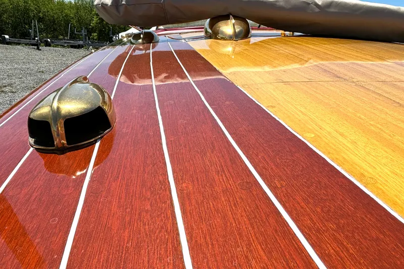 Slide: The Image of 1956 Chris-Craft Capri 21 wooden deck with polished brass fittings. - 12