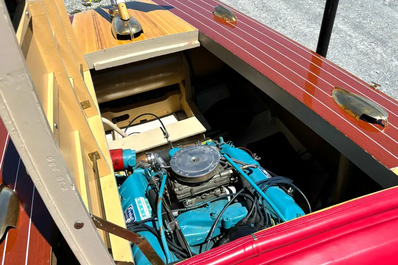 Slide: The Image of 1956 Chris-Craft Capri 21 boat engine compartment with vintage wooden detailing. - 27