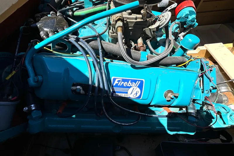 Slide: The Image of 1956 Chris-Craft Capri 21 engine, Fireball V8, vibrant blue, detailed view. - 28