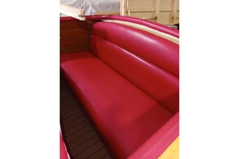 Slide: The Image of Red leather interior of a 1956 Chris-Craft Capri 21 boat. - 7