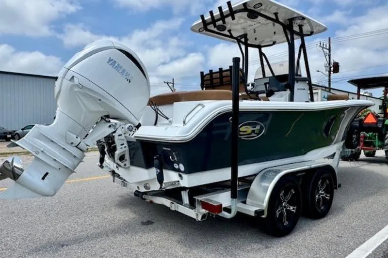Slide: The Image of 2026 Sea Hunt Ultra 219 boat with Yamaha outboard motor. - 4