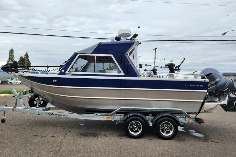 The Image of 2025 Thunder Jet 21 Chinook OS boat on trailer, side view, outdoors. - 0