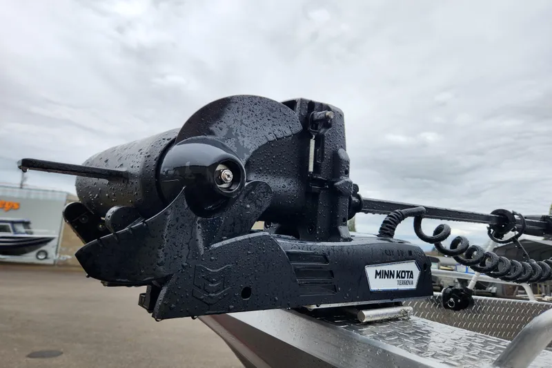 Slide: The Image of Minn Kota Terrova motor on 2025 Thunder Jet 21 Chinook OS boat, wet from rain. - 12