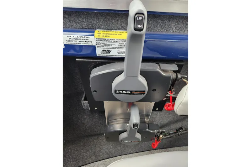 Slide: The Image of Throttle controls of a 2025 Thunder Jet 21 Chinook OS boat with Yamaha branding. - 19