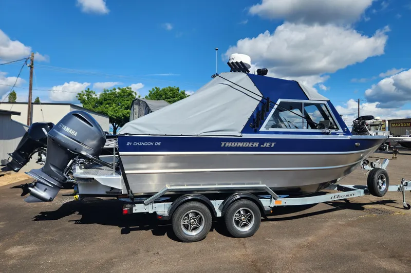 Slide: The Image of 2025 Thunder Jet 21 Chinook OS boat on trailer, featuring Yamaha outboard motor. - 27