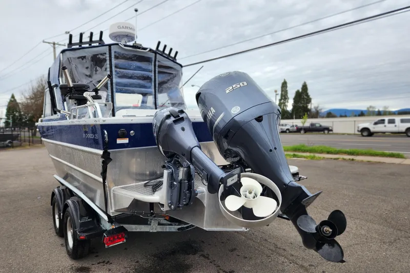 Slide: The Image of 2025 Thunder Jet 21 Chinook OS boat with Yamaha 250 outboard motor, parked on trailer. - 4