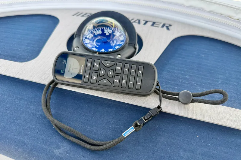 Slide: The Image of Remote control and compass on Bluewater 25t boat, 2025 model. - 25