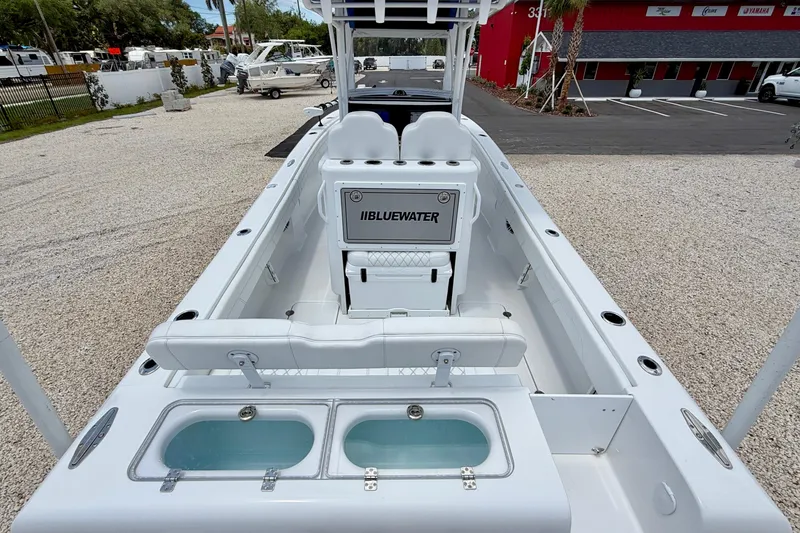 Slide: The Image of 2025 Bluewater 25t boat interior with seating and storage compartments. - 29