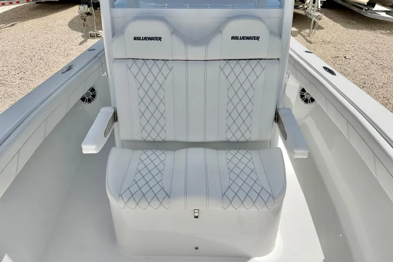 Slide: The Image of 2025 Bluewater 25t boat seating with diamond-stitched upholstery and armrests. - 42