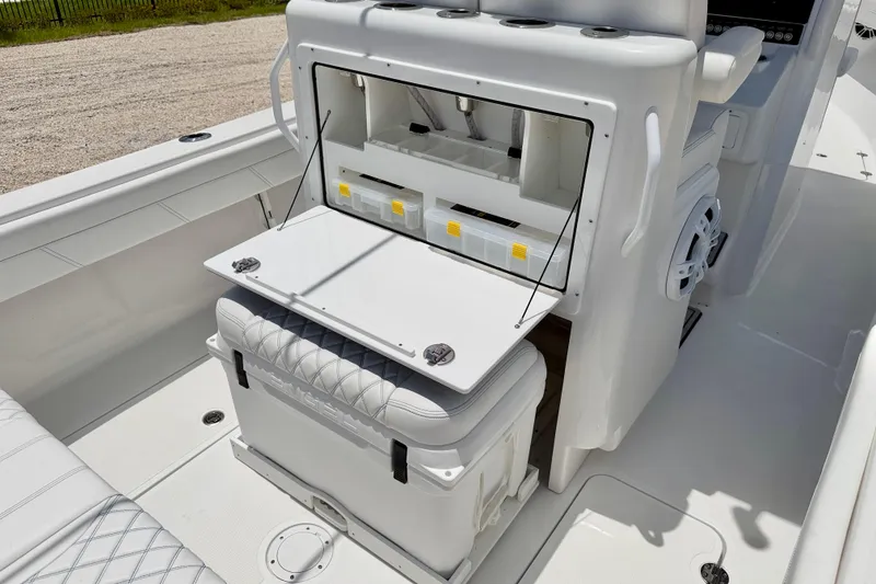 Slide: The Image of Interior view of 2025 Bluewater 25t boat featuring storage compartments and seating. - 45