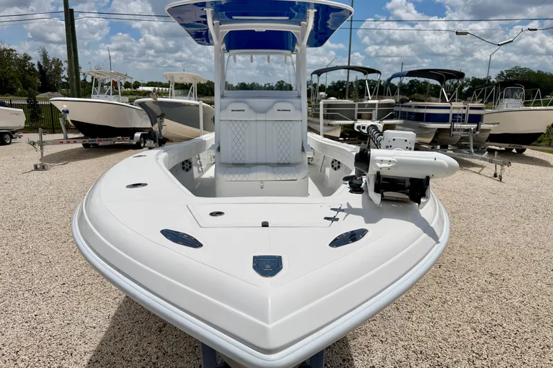 Slide: The Image of 2025 Bluewater 25t boat with sleek design, displayed outdoors under a blue sky. - 8