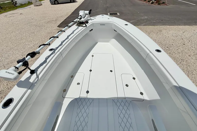Slide: The Image of 2025 Bluewater 25t boat deck with Garmin equipment, showcasing spacious and sleek design. - 9