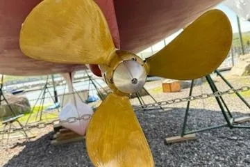 Slide: The Image of Propeller of a 2003 Beneteau 423 sailboat on dry dock. - 11