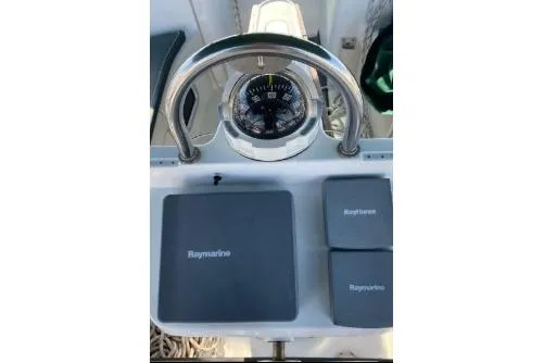 Slide: The Image of Beneteau 423 sailboat helm with Raymarine navigation equipment, 2003 model. - 13