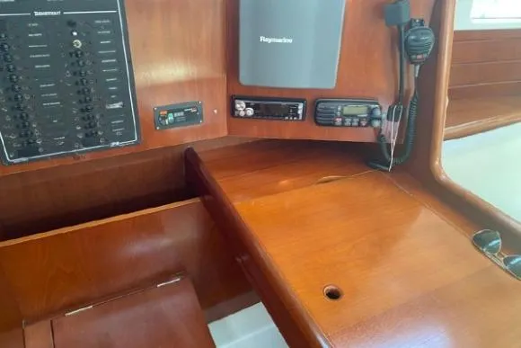 Slide: The Image of Navigation station of a 2003 Beneteau 423 yacht with communication equipment. - 22