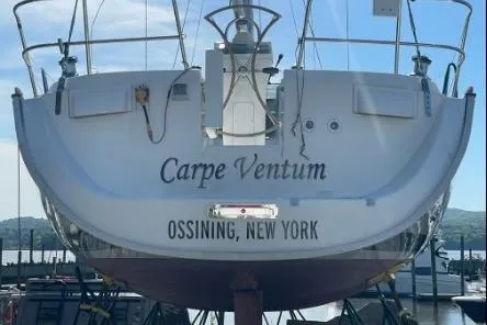 Slide: The Image of 2003 Beneteau 423 sailboat named "Carpe Ventum" docked in Ossining, New York. - 7