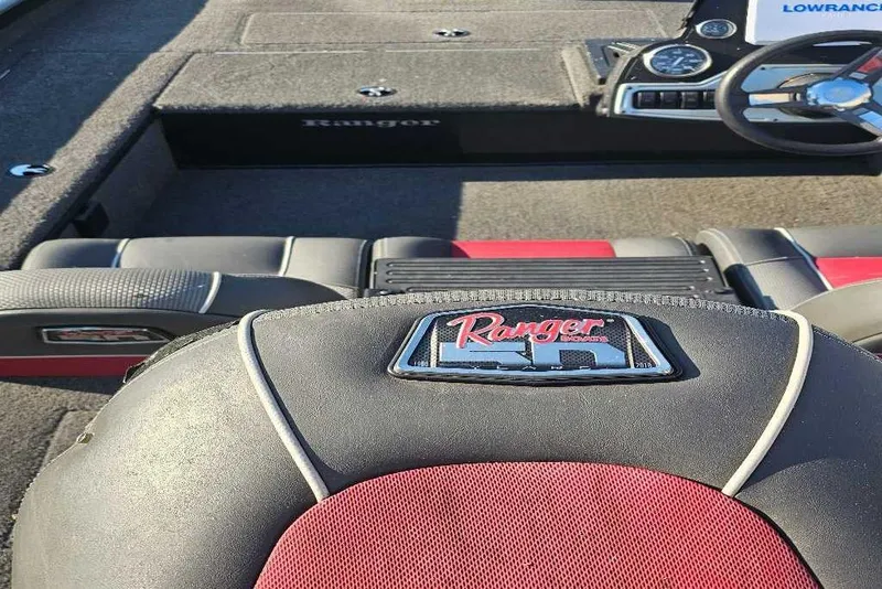Slide: The Image of 2018 Ranger RT178C boat interior with steering wheel and seating details. - 3