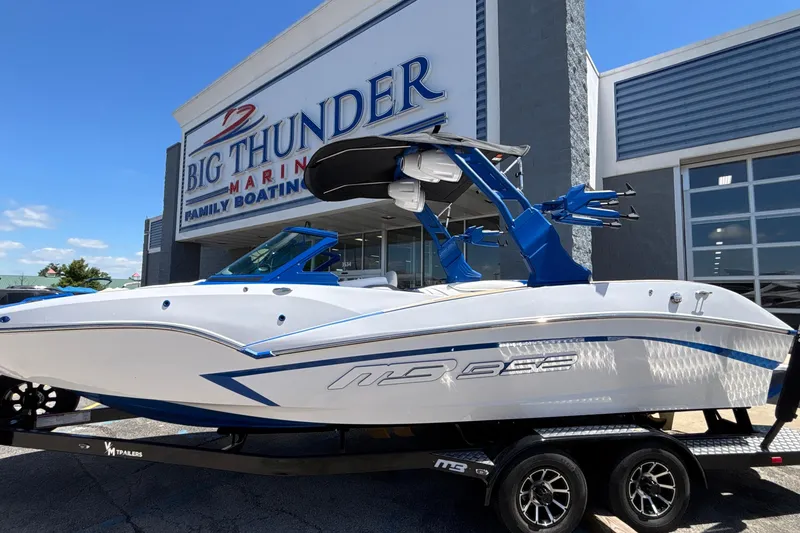 The Image of 2026 MB B52 23 Alpha boat displayed at Big Thunder Marine dealership. - 1