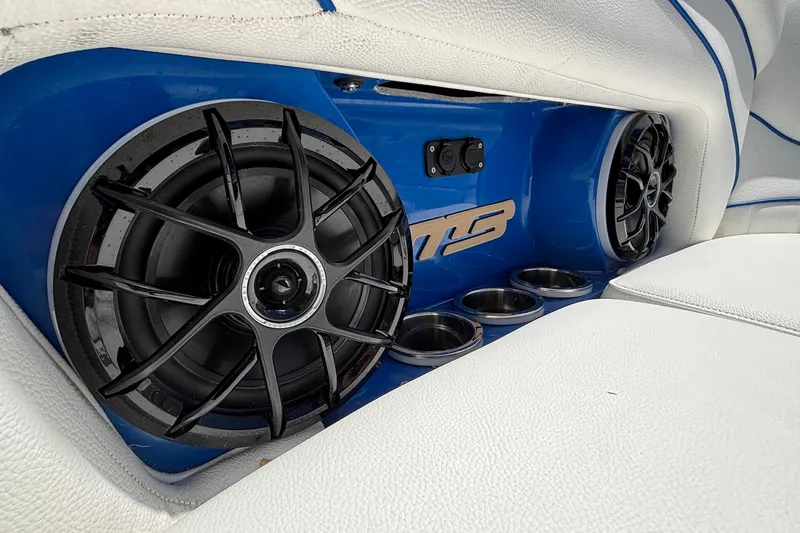 Slide: The Image of Interior of 2026 MB B52 23 Alpha with premium speakers and cup holders. - 24