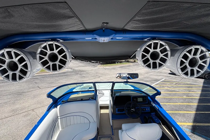 Slide: The Image of Interior view of 2026 MB B52 23 Alpha boat with advanced audio system and sleek design. - 29