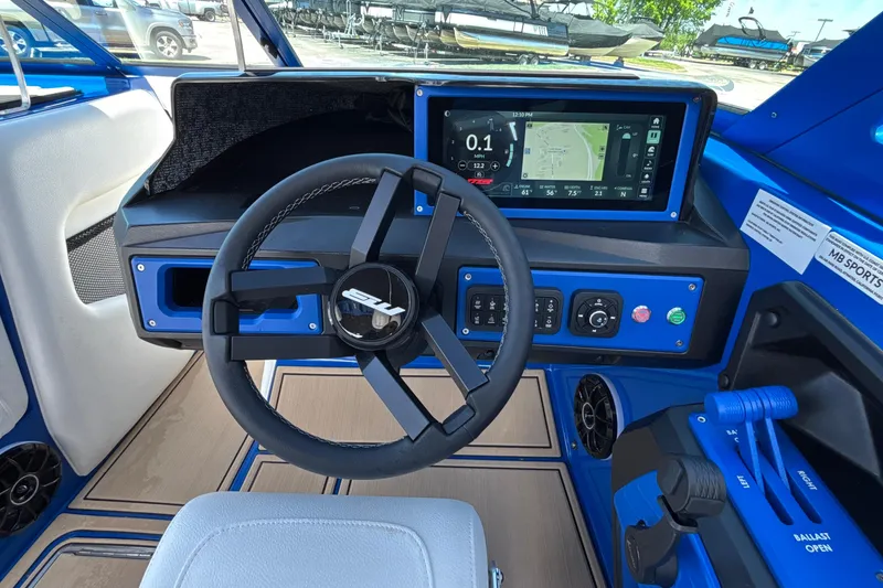 Slide: The Image of Interior of 2026 MB B52 23 Alpha boat with modern dashboard and steering wheel. - 42