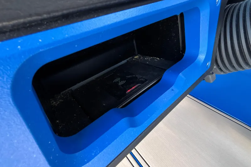 Slide: The Image of Blue compartment detail of MB B52 23 Alpha, 2026 model, with hose attachment. - 48
