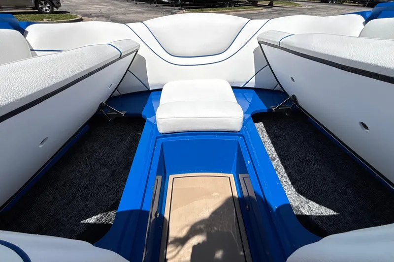 Slide: The Image of Interior of 2026 MB B52 23 Alpha boat with blue and white seating. - 53