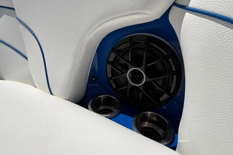 Slide: The Image of White leather interior with speaker and cup holders in 2026 MB B52 23 Alpha. - 58