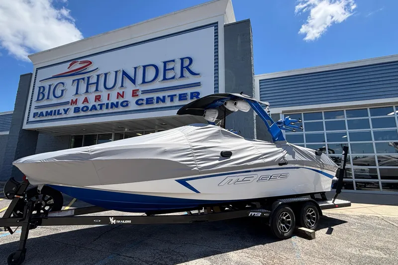 Slide: The Image of 2026 MB B52 23 Alpha boat at Big Thunder Marine, covered and on a trailer. - 60