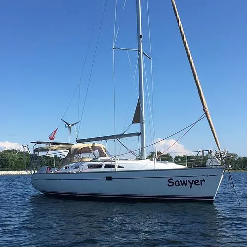 The Image of 2004 Jeanneau Sun Odyssey 37 sailboat named Sawyer on calm water. - 0