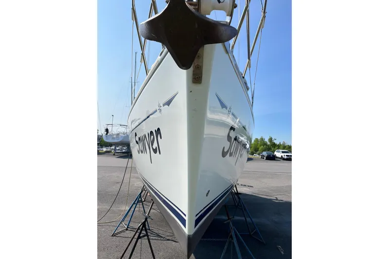 Slide: The Image of 2004 Jeanneau Sun Odyssey 37 sailboat on stands, viewed from the bow. - 17