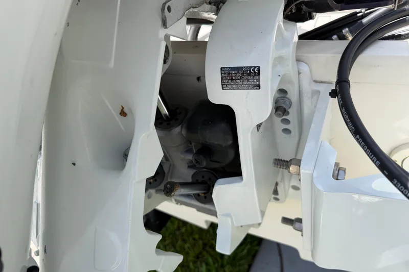 Slide: The Image of Close-up of 2023 Carolina Skiff 21 LS boat engine components and wiring. - 10