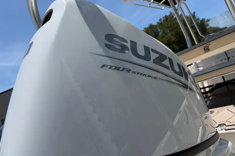 Slide: The Image of 2023 Carolina Skiff 21 LS with Suzuki Four Stroke engine, close-up view. - 11