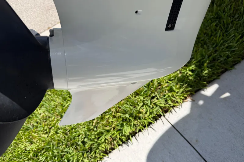 Slide: The Image of Close-up of a 2023 Carolina Skiff 21 LS boat motor detail. - 12