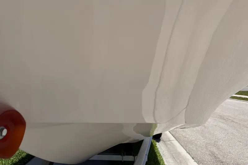 Slide: The Image of 2023 Carolina Skiff 21 LS boat hull on trailer, close-up view. - 26