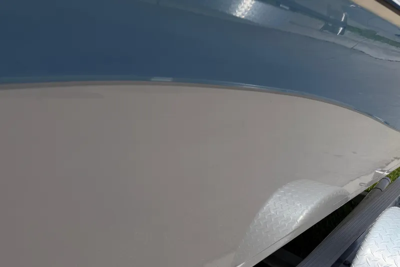 Slide: The Image of 2023 Carolina Skiff 21 LS boat hull with trailer, showcasing sleek design and craftsmanship. - 28