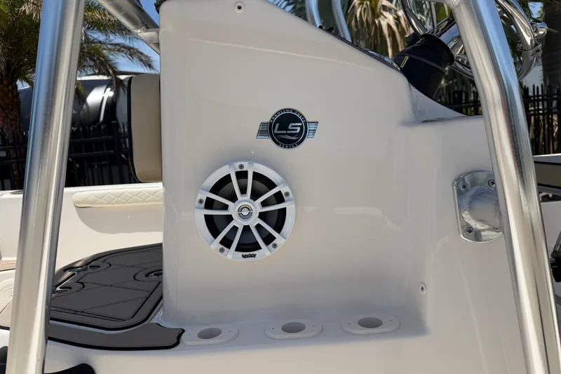 Slide: The Image of 2023 Carolina Skiff 21 LS boat console with speaker and logo detail. - 30