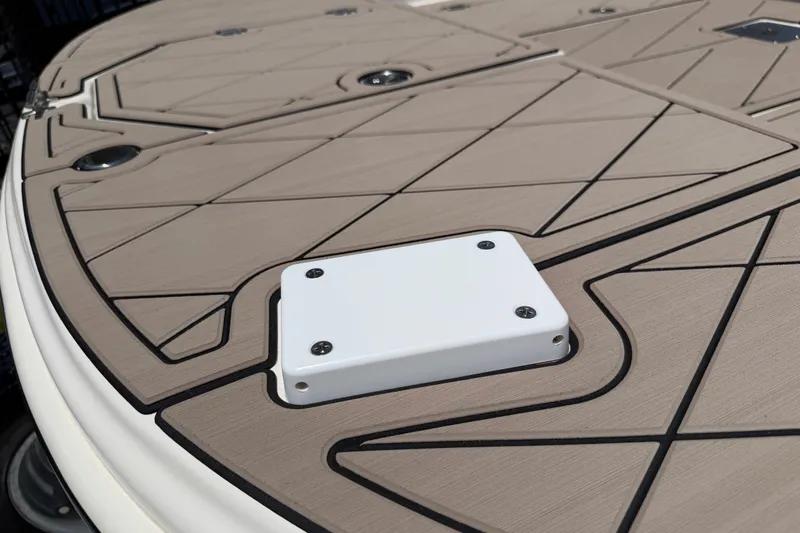 Slide: The Image of 2023 Carolina Skiff 21 LS boat deck with textured surface and mounted hardware. - 32