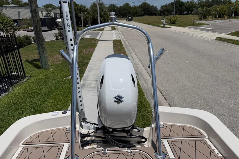 Slide: The Image of 2023 Carolina Skiff 21 LS boat with Suzuki outboard motor and Minn Kota trolling motor. - 40
