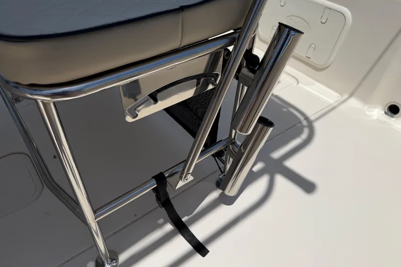 Slide: The Image of 2023 Carolina Skiff 21 LS boat seat with stainless steel rod holders. - 43