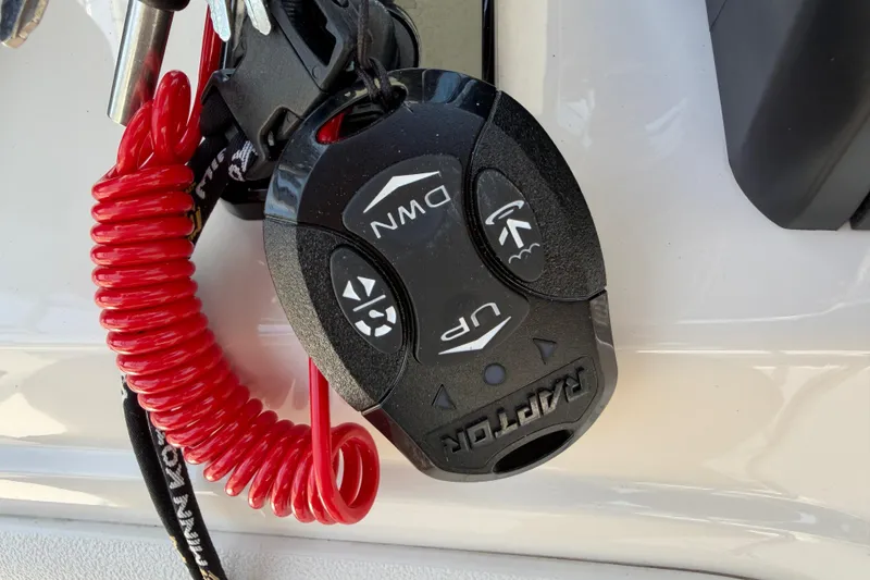Slide: The Image of Remote control with red coiled lanyard for 2023 Carolina Skiff 21 LS boat. - 52