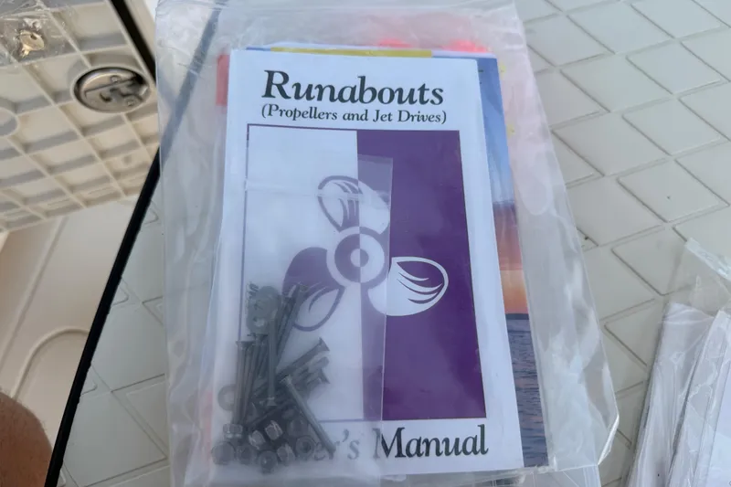Slide: The Image of Boat manual and hardware kit for 2023 Carolina Skiff 21 LS. - 57