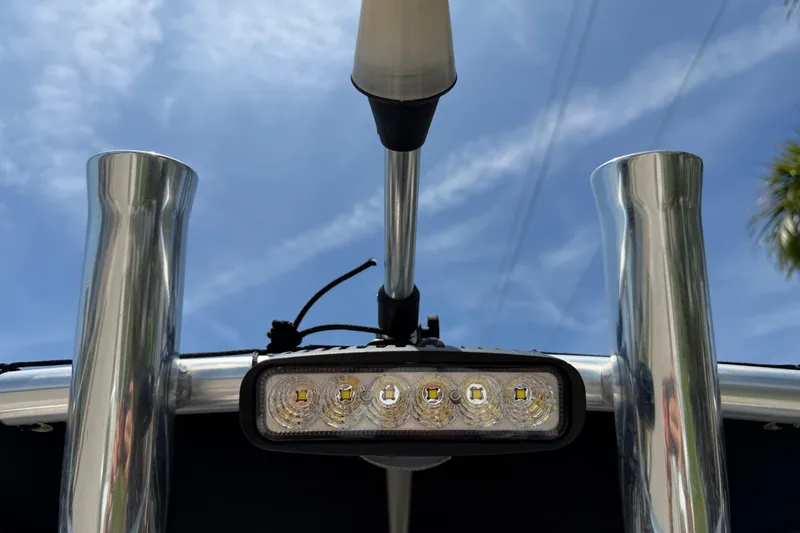 Slide: The Image of 2023 Carolina Skiff 21 LS boat with LED light and stainless steel rod holders. - 66