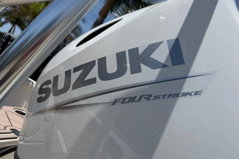 Slide: The Image of Suzuki Four Stroke engine on 2023 Carolina Skiff 21 LS boat, close-up view. - 7