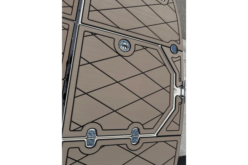 Slide: The Image of 2023 Carolina Skiff 21 LS deck with geometric pattern and metal fixtures. - 72