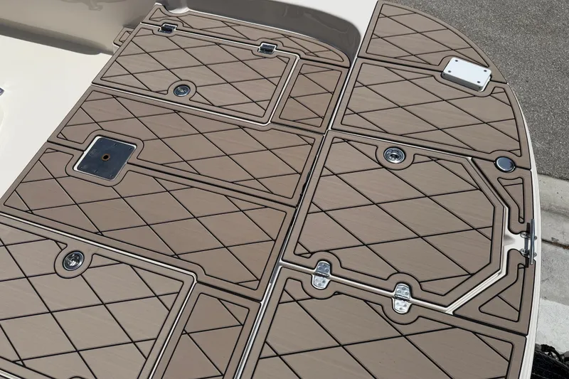 Slide: The Image of 2023 Carolina Skiff 21 LS boat deck with diamond-patterned non-slip surface. - 75