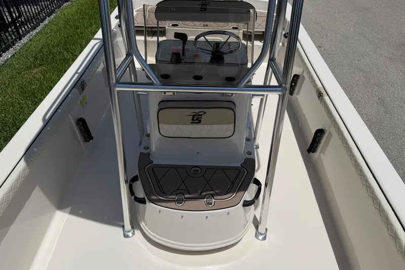 Slide: The Image of 2023 Carolina Skiff 21 LS boat interior with steering console and seating area. - 77