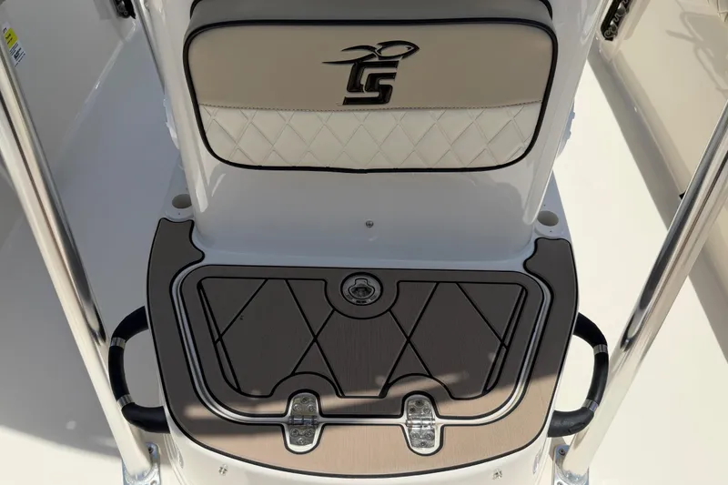 Slide: The Image of 2023 Carolina Skiff 21 LS boat console with stylish seating and storage compartment. - 80