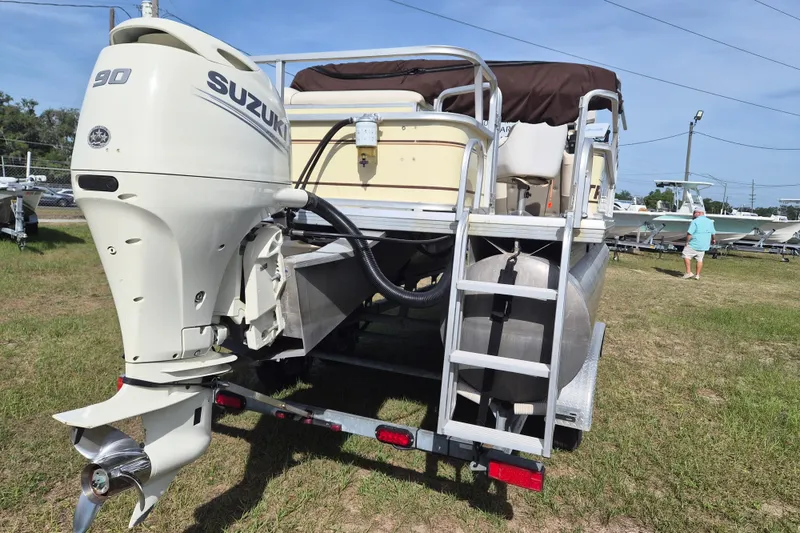 Slide: The Image of 2004 Sun Tracker Fishin' Barge 20 DLX with Suzuki 90 outboard motor. - 3