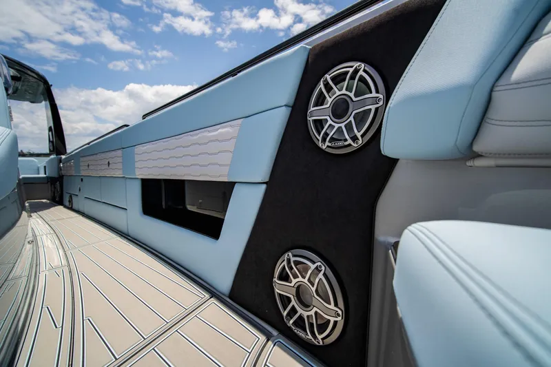 Slide: The Image of 2026 Cigarette 41' Nighthawk interior with sleek design and premium audio system. - 8
